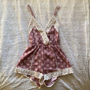 In the Beginning Floral Romper in Mauve